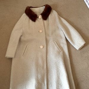 Vintage cream coat with faux fur collar. Size 14/16. Satin lining. Heavy coat